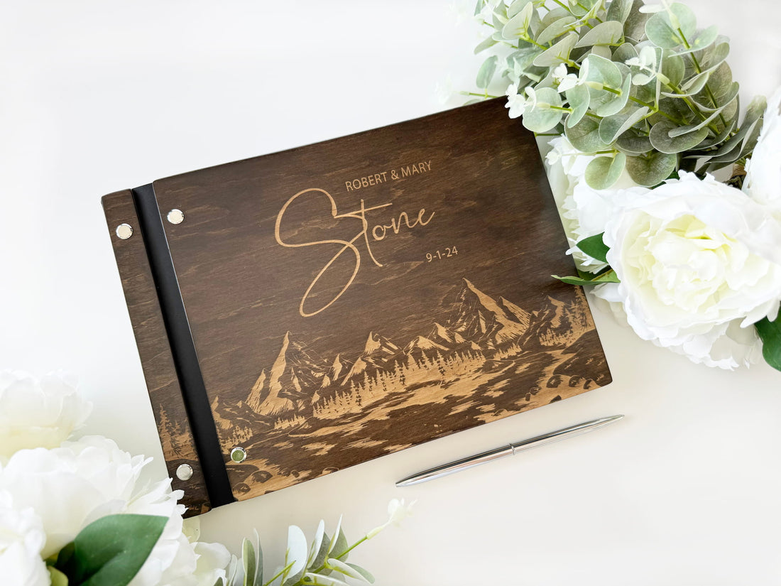 Personalized wooden wedding guest book with outdoor mountain theme