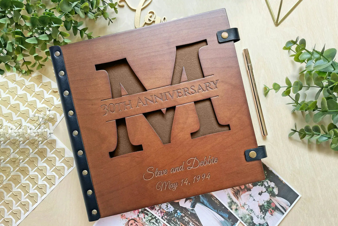 Personalized wooden photo album with laser cut split letter M monogram for 30th anniversary gift.
