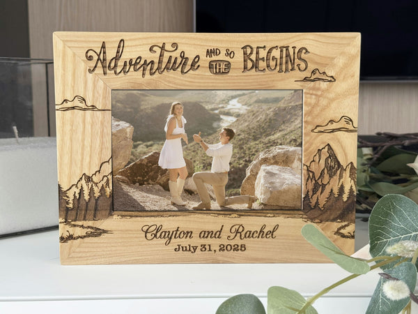 Personalized mountain adventure picture frame with engraved names and date in oak