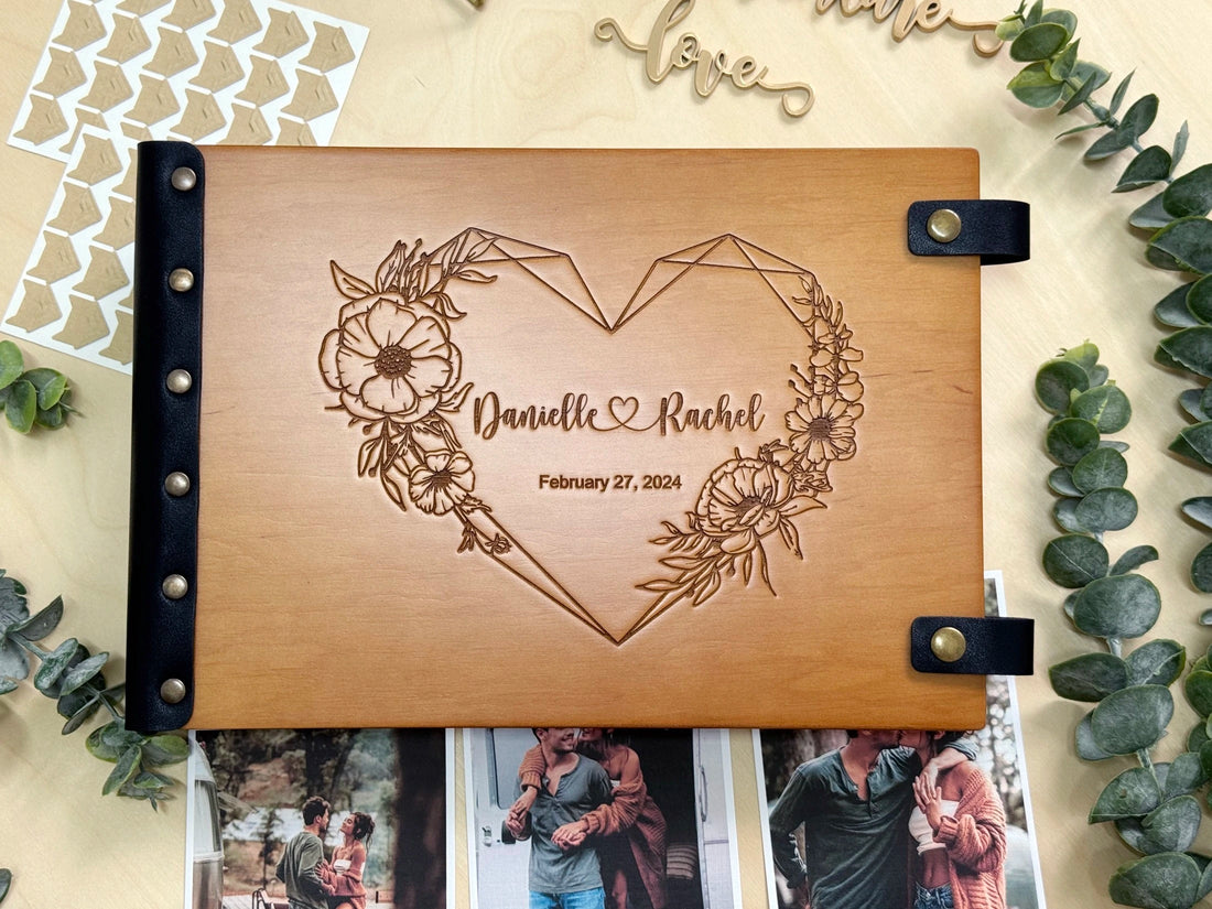 personalized floral heart wedding photo album with engraved names and date on oak wood