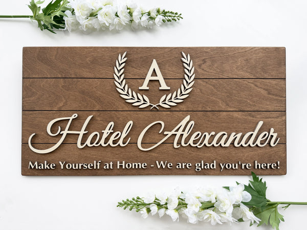 Personalized hotel name sign with monogram wreath walnut pallet wood