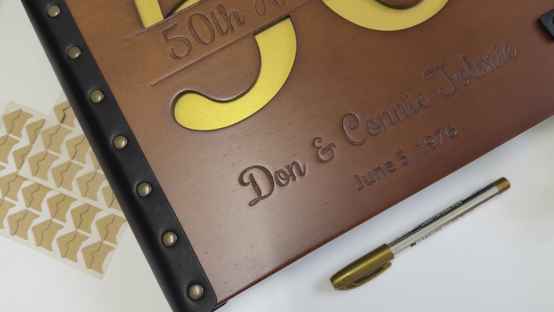 engraved names and wedding date on personalized anniversary photo album