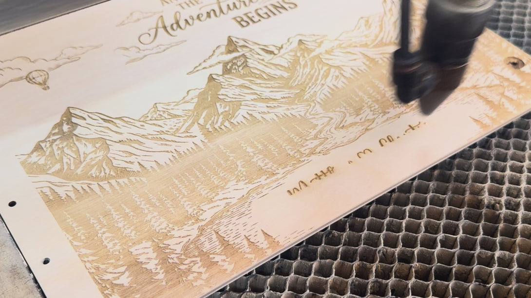 Personalized wooden wedding photo album being handcrafted from start to finish, including laser cutting the tree design, engraving the custom cover, sanding, assembling the scrapbook pages, and preparing the finished handmade album.